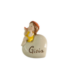 Bimba in resina su cuore con magnete